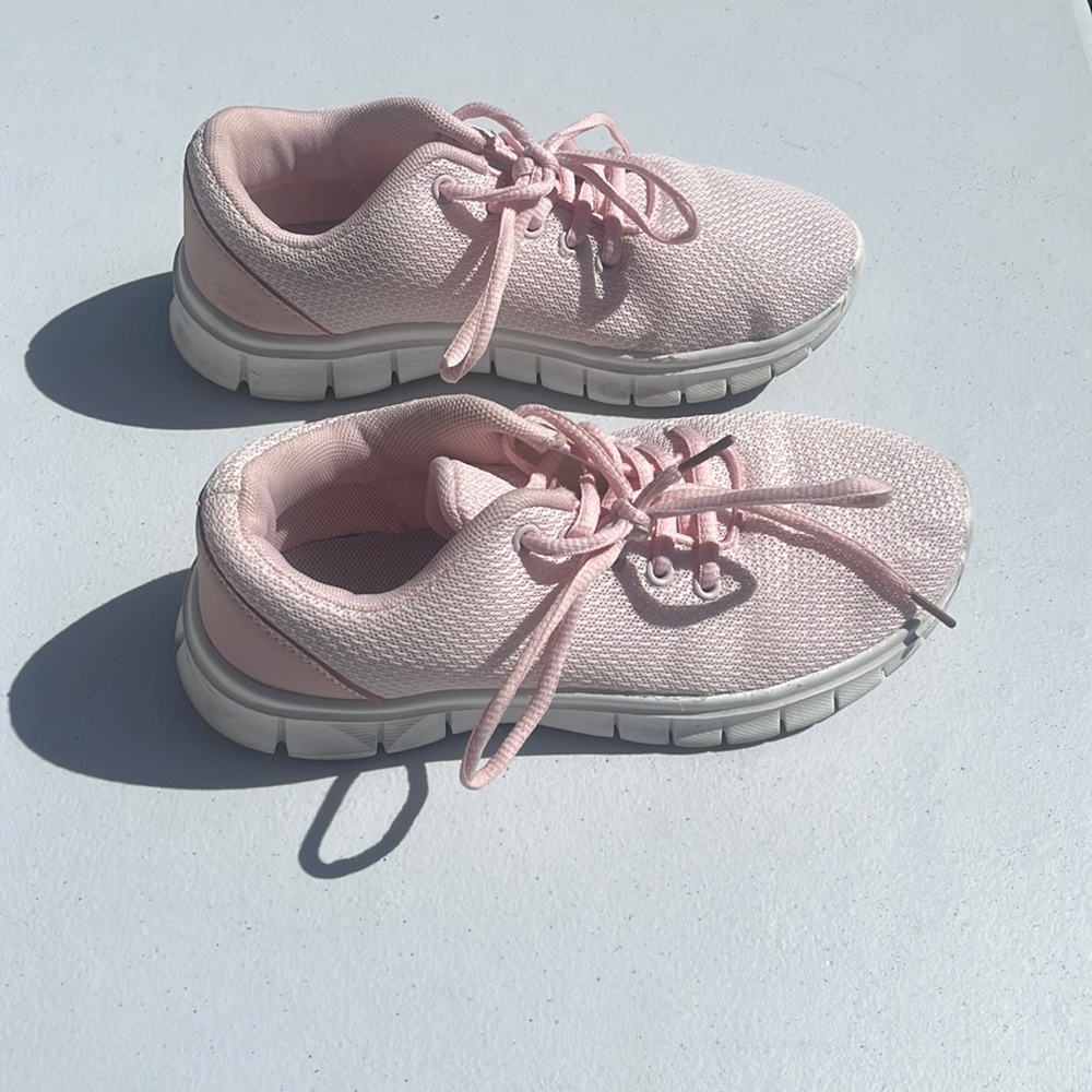 Used pink shoes in fair condition
